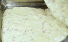 Pouring dough on a tray